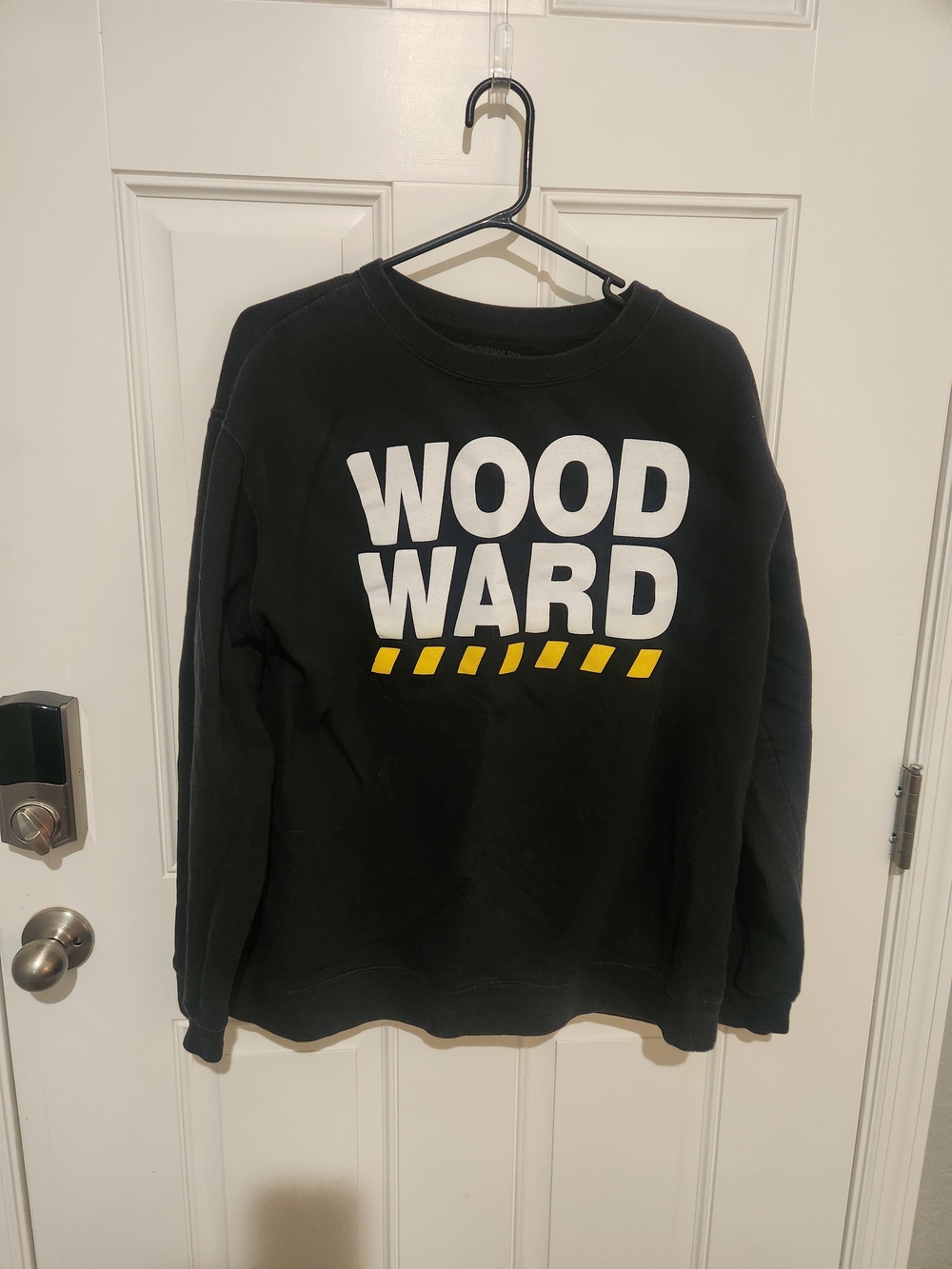 Woodward Black Crewneck Sweatshirt with White Logo and Yellow Accent